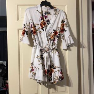 Floral romper with elbow sleeves